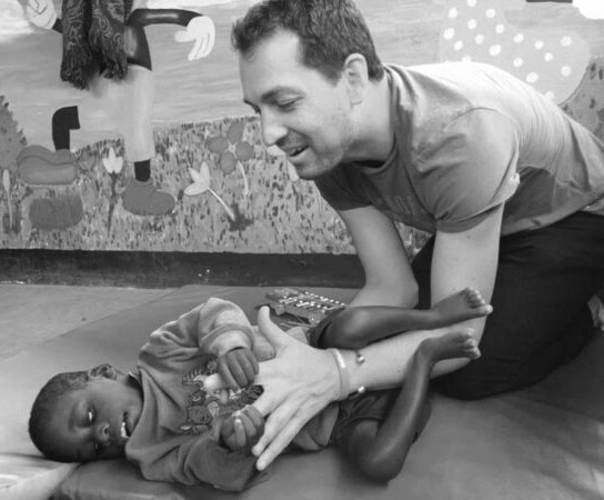 Steve Rose working with a child during a therapy session